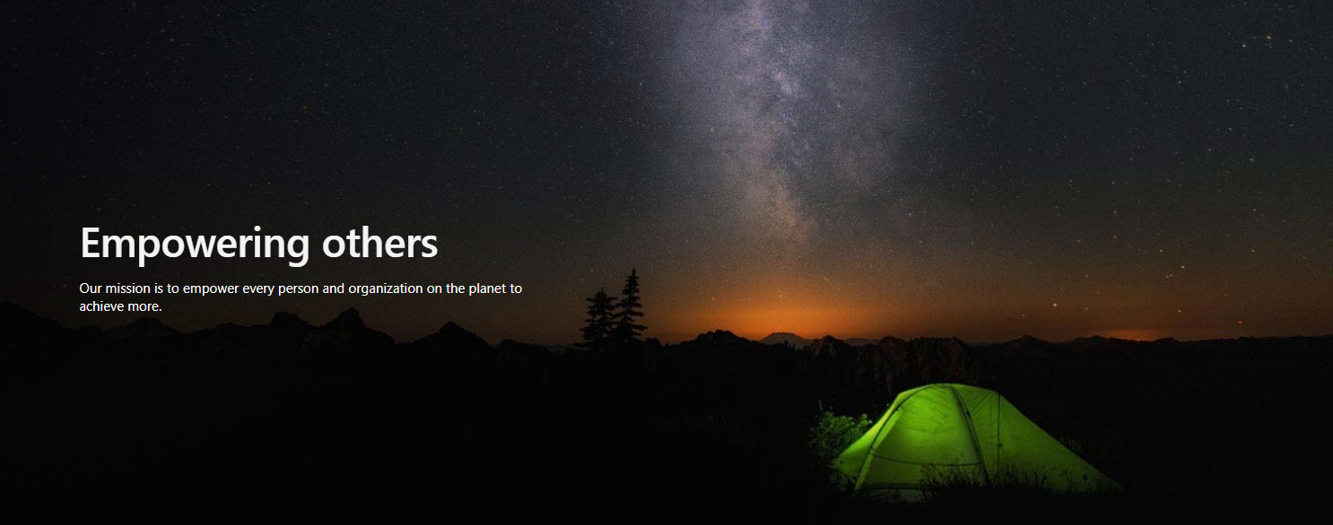 Microsoft's Mission Statement - tent under night sky with milky way hovering above